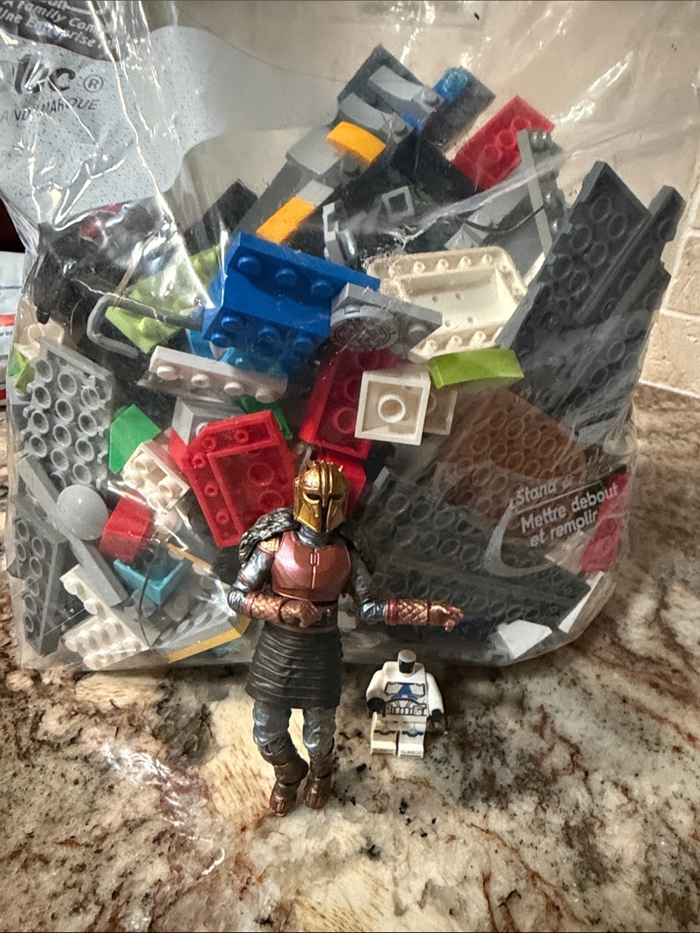 Lego and other toys in a gallon bag